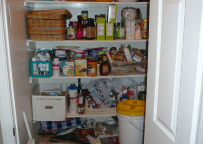 A small, crowded pantry